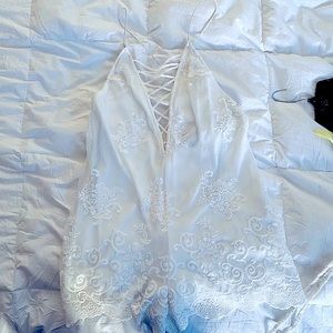 White crisscross back, lace up romper